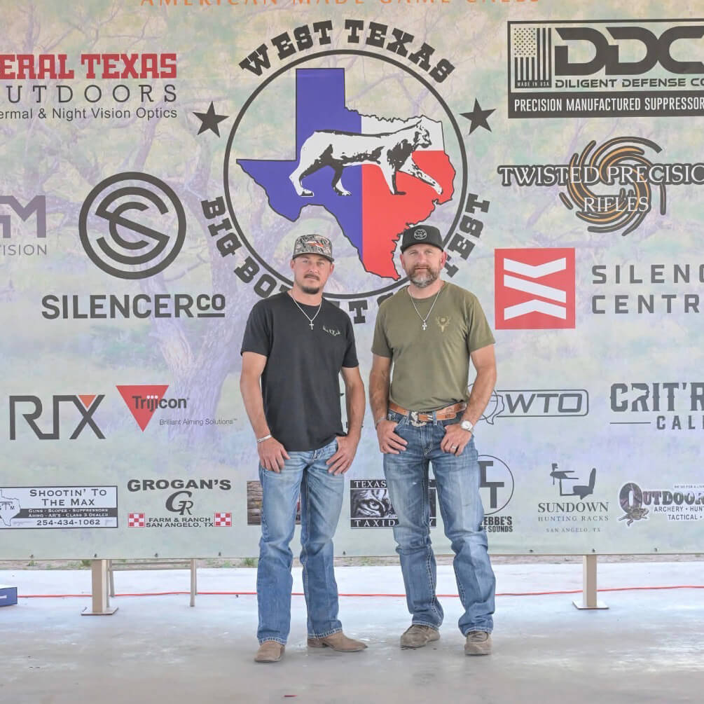 Greg Tompkins and Derek Deharde with their twelve-bobcat haul at the West Texas Big Bobcat Contest.