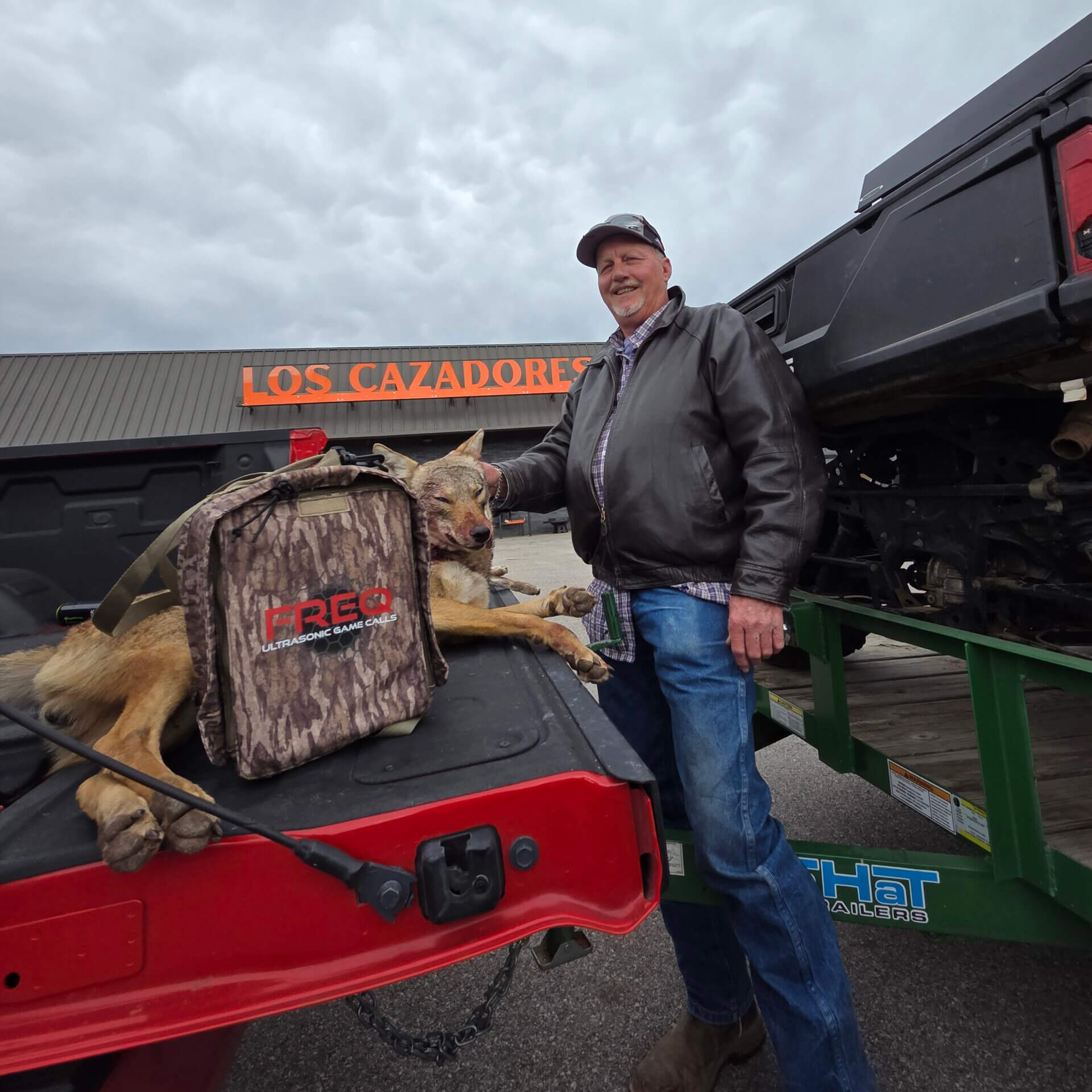 Kelly Dee Wills, Kent Everett and Mackey Bolinger with a heavy coyote at the Los Cazadores Predator Contest, Buchanan Dam side pot.