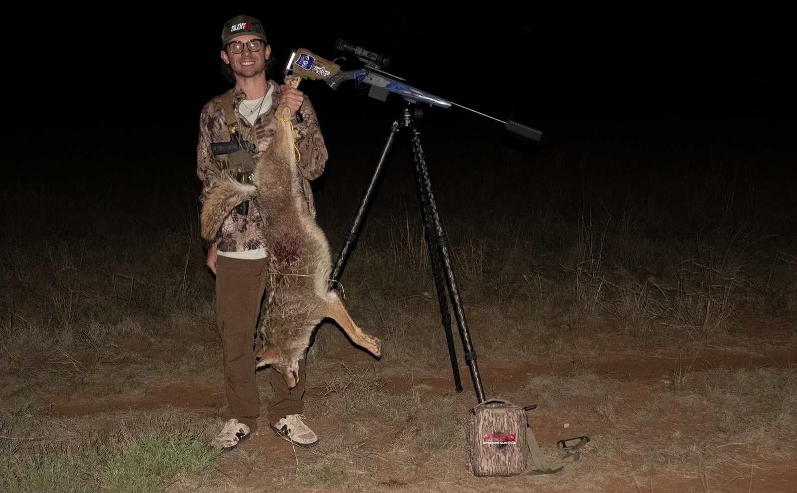 Ian Shugart holds up a coyote called in to 50 yards with the FREQ ultrasonic game call
